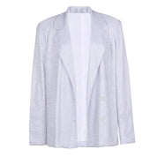 Giacca blazer donna argento scintillante, elegante e moderna, ideale per eventi formali. Design classico con bottoni, tessuto lucido.