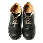 Scarpe uomo in pelle nera, stringate, suola robusta, design classico. Calzature eleganti per occasioni formali e casual.