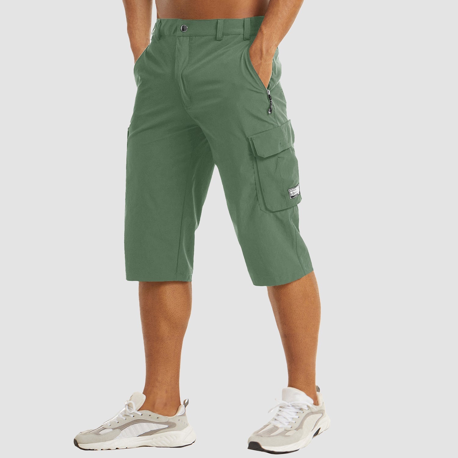 Pantaloncini cargo verdi da uomo, tasche multiple, lunghezza al ginocchio, stile casual, perfetti per attività all'aperto.