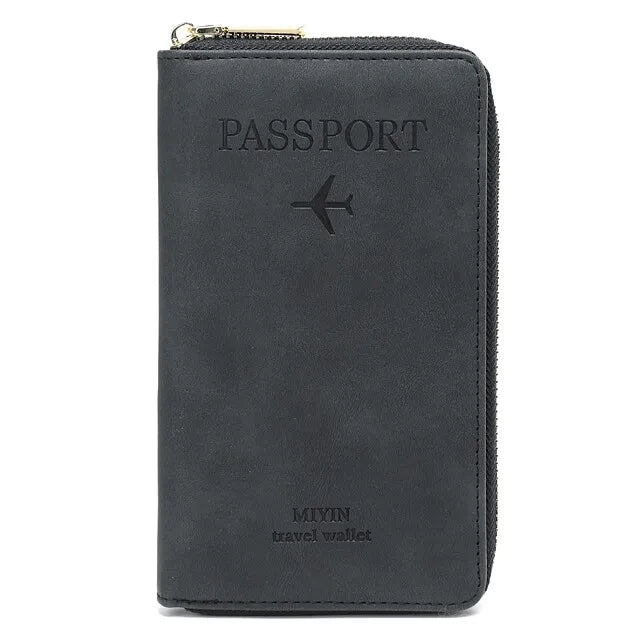 Portafoglio da viaggio nero in pelle con cerniera, design per passaporto, logo aereo inciso, ideale per organizzare documenti e carte.
