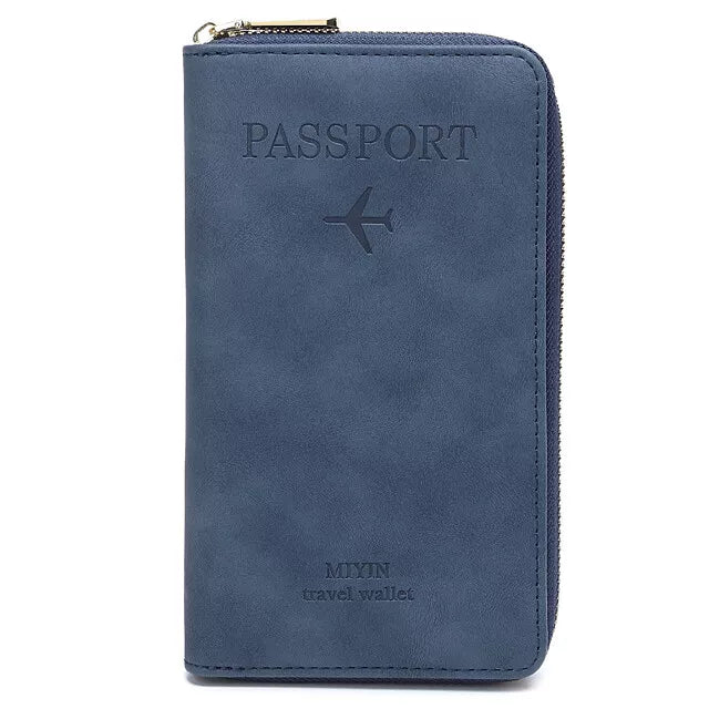 Portafoglio da viaggio blu in pelle sintetica con cerniera, design aereo, ideale per passaporto e documenti. Accessorio viaggio elegante e funzionale.