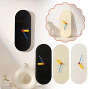 Moderne Wandklok mit farbigen Zeigern 4