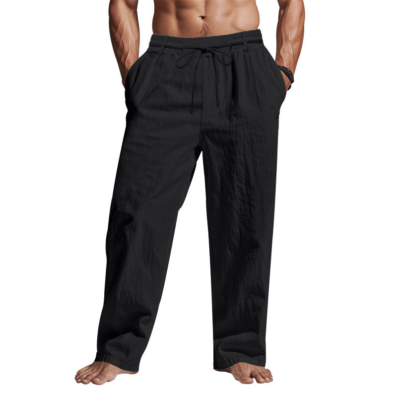 Pantaloni uomo neri in lino, stile casual, con elastico in vita e laccio regolabile. Ideali per look estivi e rilassati.