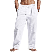Pantaloni uomo bianchi in lino, stile casual, con coulisse in vita, tasche laterali, ideali per l'estate e il tempo libero.