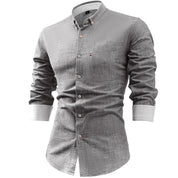 Camicia uomo grigia elegante, maniche lunghe, colletto button-down, tessuto leggero, ideale per ufficio e occasioni formali. Moda maschile.