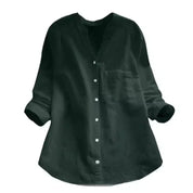Camicia donna nera, maniche lunghe, bottoni bianchi, tasca frontale, stile casual, tessuto leggero, ideale per look quotidiani eleganti.