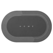 Tappeto ovale grigio scuro con scritta "HOME", design moderno, antiscivolo, ideale per ingresso o soggiorno, decorazione casa elegante.