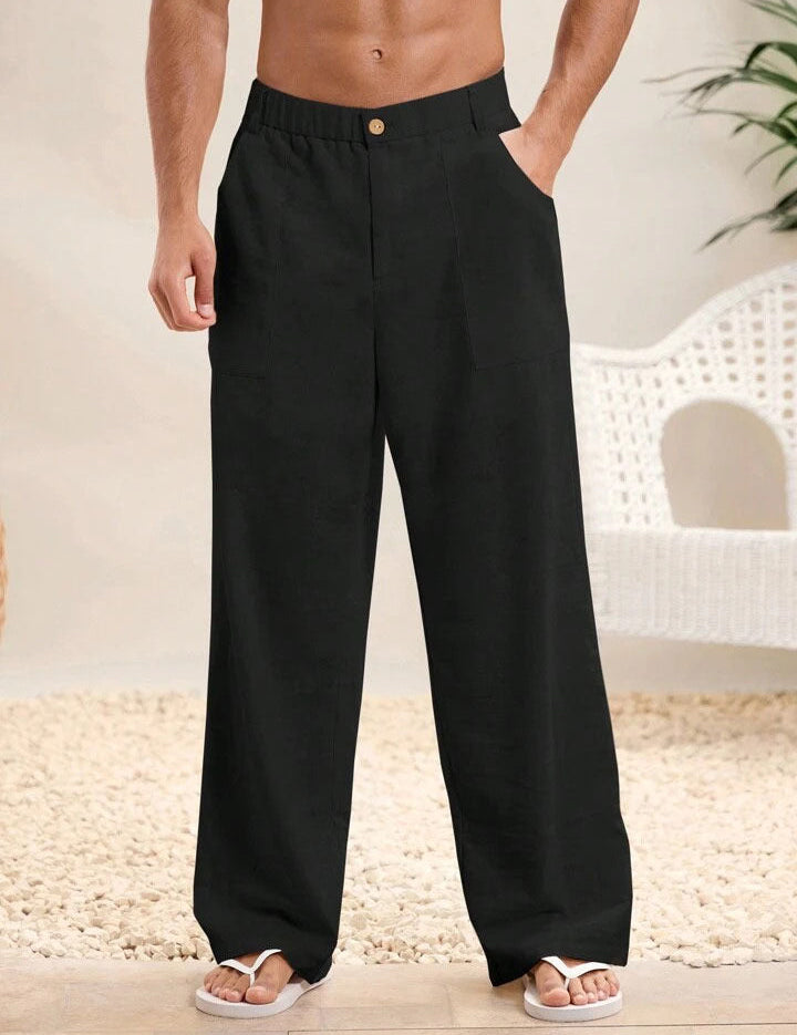 Pantaloni neri da uomo in lino, larghi e comodi, con tasche laterali, ideali per l'estate. Abbigliamento casual elegante.
