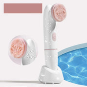 Spazzola elettrica per pulizia viso impermeabile, bianca e rosa, con base di ricarica. Ideale per esfoliazione e cura della pelle.