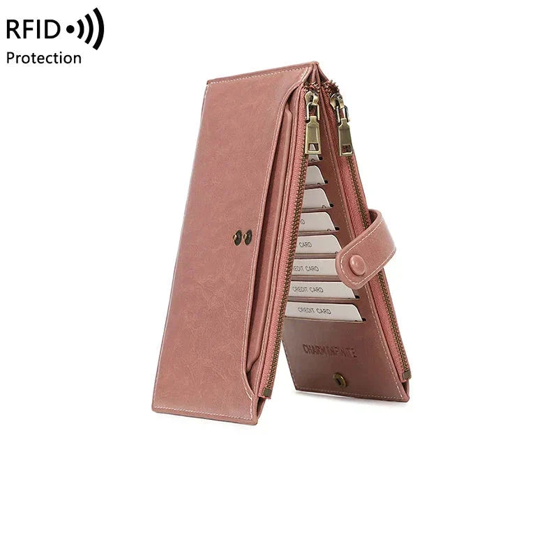 Portafoglio donna in pelle rosa con protezione RFID, design elegante, chiusura a zip, scomparti per carte di credito, ideale per sicurezza e stile.