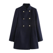 Cappotto blu scuro da donna, doppio petto, elegante, con bottoni dorati, collo alto, ideale per l'inverno. Moda femminile, abbigliamento invernale.