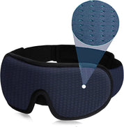 Maschera per dormire in memory foam blu scuro, design ergonomico, traspirante, con dettaglio tessuto a nido d'ape, ideale per viaggi e relax.