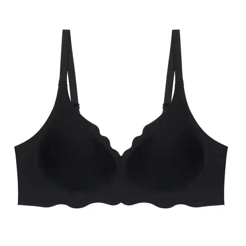 Reggiseno nero senza cuciture, design a onde, spalline regolabili, comfort quotidiano, intimo donna elegante e moderno.