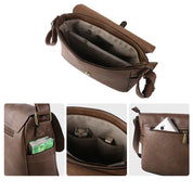 Borsa a tracolla in pelle marrone con scomparti multipli, chiusura a zip, tasche interne ed esterne, ideale per uomo e donna, stile casual ed elegante.