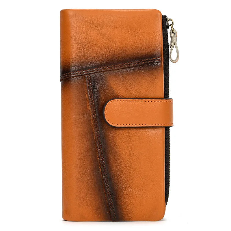 Portafoglio in pelle marrone con chiusura a zip e bottone, design elegante e moderno, accessorio moda uomo, alta qualità, ideale per regali.