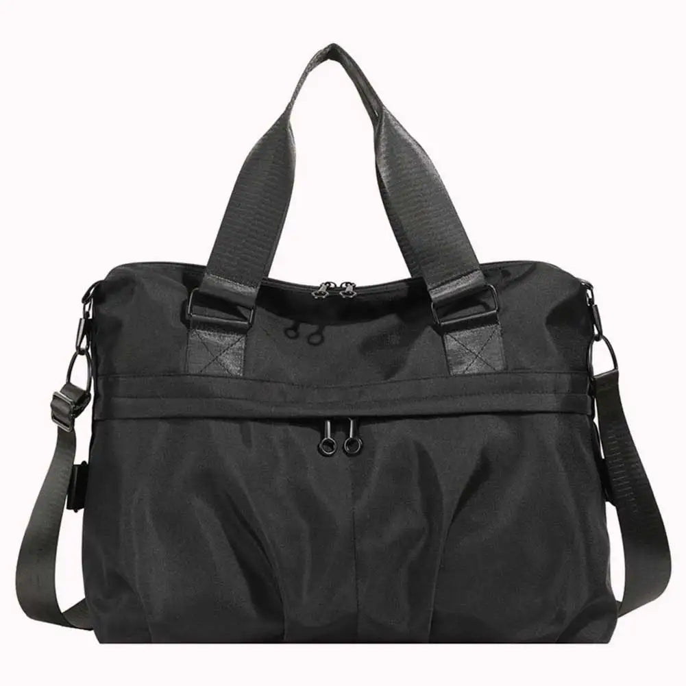Borsa da viaggio nera unisex, spaziosa e resistente, con manici e tracolla regolabile. Ideale per viaggi, palestra e uso quotidiano.