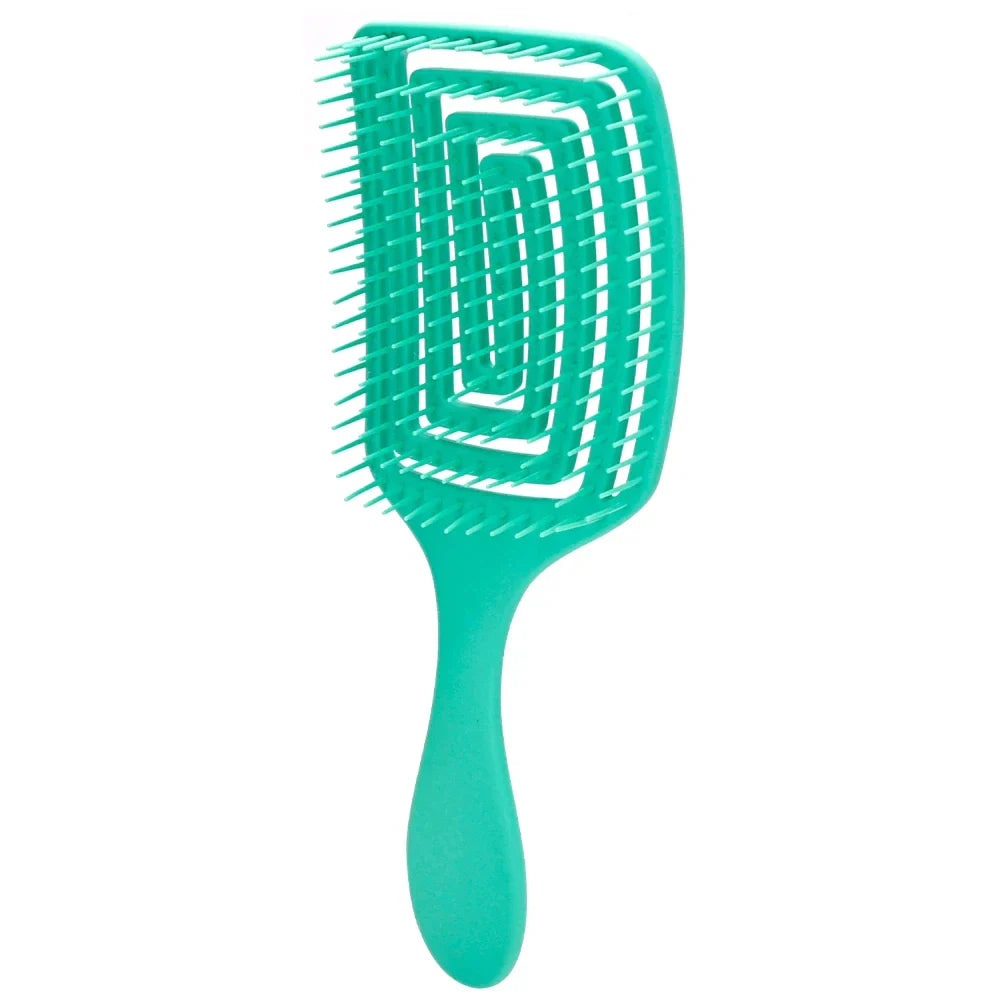 Spazzola districante verde menta con setole flessibili, ideale per capelli ricci e lisci. Design ergonomico per una facile pettinatura.