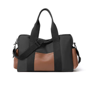 Borsa a tracolla nera e marrone, design elegante, tasche laterali, manici robusti, ideale per viaggi e uso quotidiano. Accessorio moda versatile.