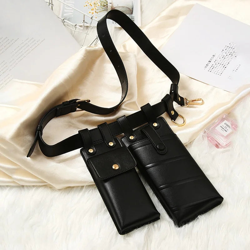 Cintura in pelle nera con doppia custodia, design elegante e funzionale, ideale per accessori moda e praticità quotidiana.