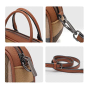 Borsa a tracolla in pelle marrone e tessuto beige, dettagli in metallo nero, chiusura con zip, manico superiore e tracolla regolabile.