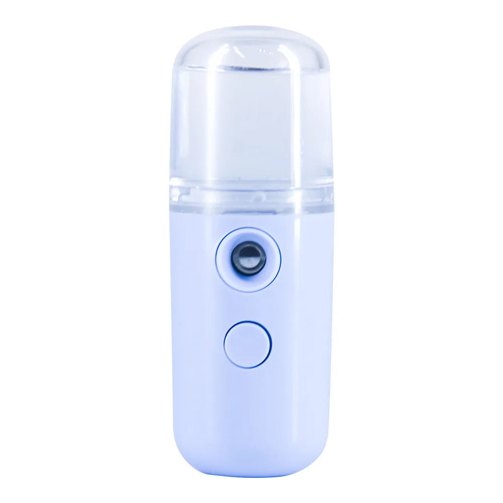 Mini nebulizzatore portatile bianco, ricaricabile USB, per idratazione viso. Design compatto, ideale per skincare e viaggio.