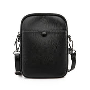 Borsa a tracolla in pelle nera, design compatto, chiusura con zip e bottone, ideale per uomo e donna, accessorio moda elegante e pratico.