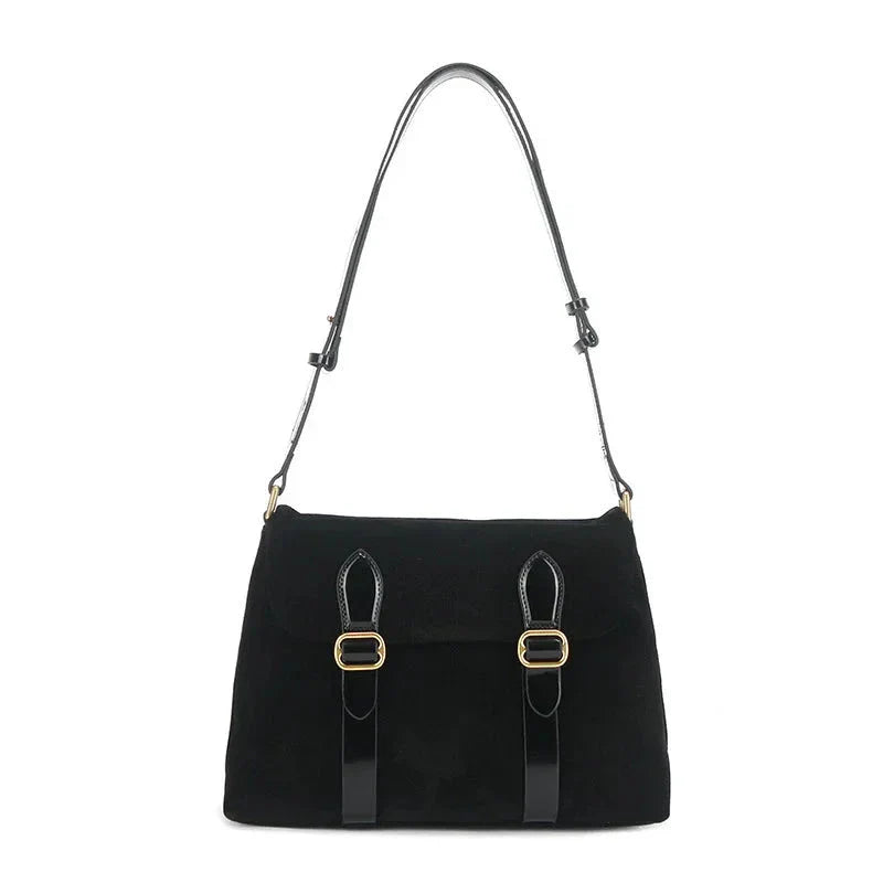 Borsa a tracolla nera in pelle con fibbie dorate, design elegante e moderno, ideale per moda femminile e accessori di lusso.
