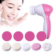 Dispositivo per pulizia viso rosa e bianco con testine intercambiabili, esfoliante elettrico, cura della pelle, bellezza, skincare routine.