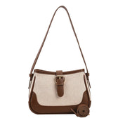 Borsa a tracolla donna in pelle marrone e tessuto beige, design elegante con fibbia, ideale per moda casual e accessori di tendenza.