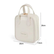Borsa da viaggio bianca in pelle, dimensioni 20x18x7,5 cm, con manici e chiusura a zip. Ideale per organizzare accessori da viaggio.