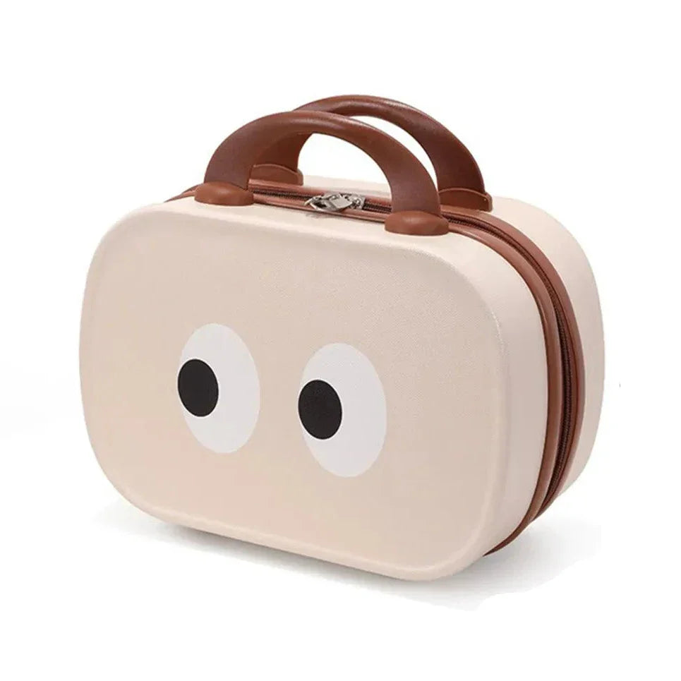 Valigia per bambini beige con occhi decorativi, manico marrone, design compatto, ideale per viaggi, bagaglio a mano, stile giocoso e funzionale.