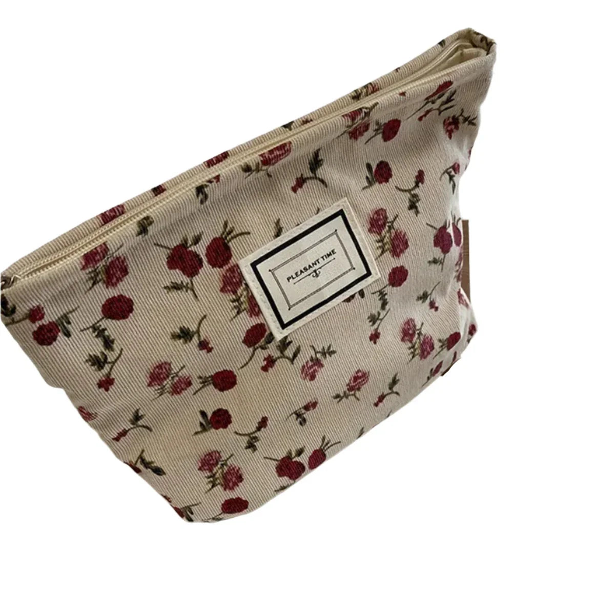 Astuccio cosmetico floreale beige con rose rosse, chiusura a zip, design elegante, ideale per trucco e accessori da viaggio.