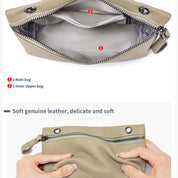 Borsa a tracolla in pelle beige, morbida e delicata, con scomparto principale e tasca interna con zip. Design elegante e funzionale.