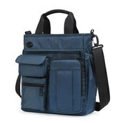 Borsa a tracolla unisex blu con tasche multiple, design moderno e funzionale, ideale per lavoro e viaggio. Materiale resistente e tracolla regolabile.