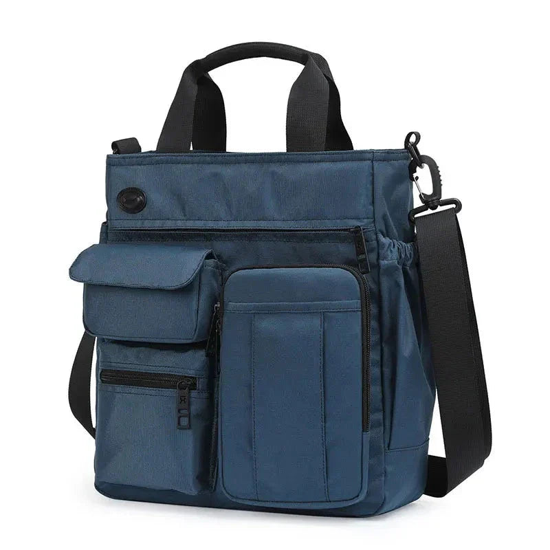 Borsa a tracolla unisex blu con tasche multiple, design moderno e funzionale, ideale per lavoro e viaggio. Materiale resistente e tracolla regolabile.