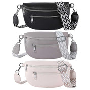 Tre marsupi in ecopelle con cerniere, tracolle regolabili a motivo geometrico: nero, grigio e beige. Accessori moda donna, pratici e versatili.