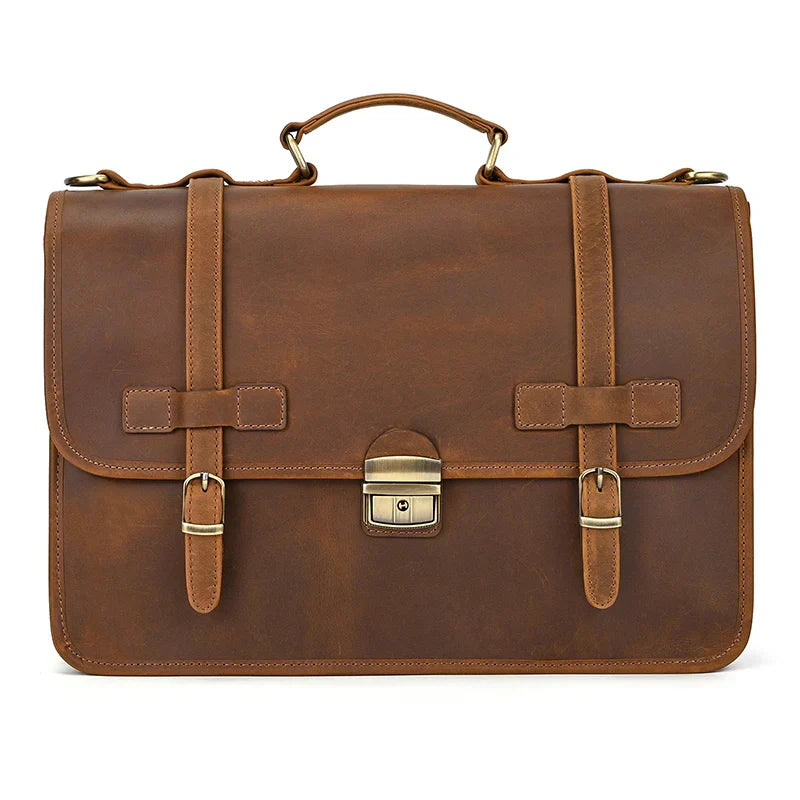 Borsa ventiquattrore in pelle marrone, design classico con fibbie e manico superiore. Ideale per lavoro e ufficio. Elegante e resistente.