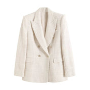 Giacca donna elegante in tweed bianco, doppio petto, bottoni dorati, tasche frontali. Ideale per look formali e moda autunnale.