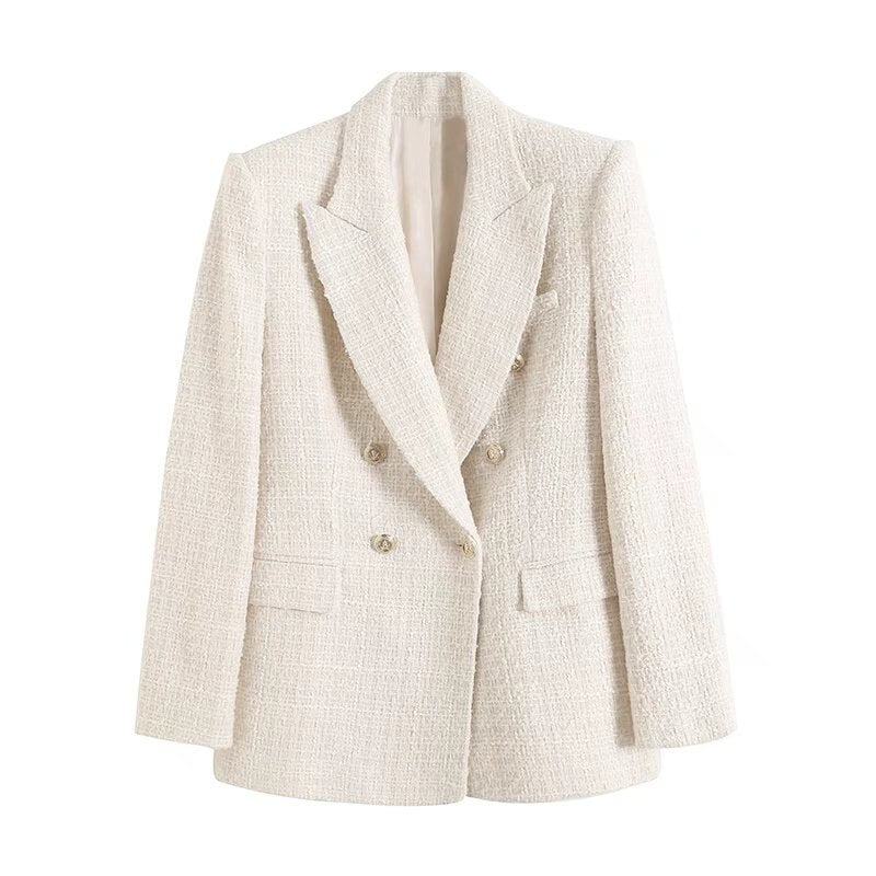 Giacca donna elegante in tweed bianco, doppio petto, bottoni dorati, tasche frontali. Ideale per look formali e moda autunnale.