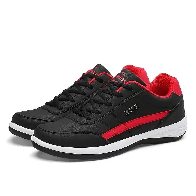 Scarpe sportive uomo nere e rosse, design moderno, suola bianca antiscivolo, ideali per corsa e tempo libero. Comfort e stile garantiti.