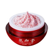 Crema viso Dragon Blood in barattolo rosso da 15g, texture cremosa rosa, idratante e rigenerante, skincare anti-età, prodotto di bellezza.