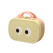 Valigia per bambini gialla con occhi disegnati, manico rosa, design giocoso, ideale per viaggi, bagaglio a mano, resistente e leggera.