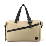 Borsa da viaggio beige con manici neri, design moderno e tasche multiple. Ideale per viaggi, palestra e uso quotidiano. Accessorio unisex elegante.