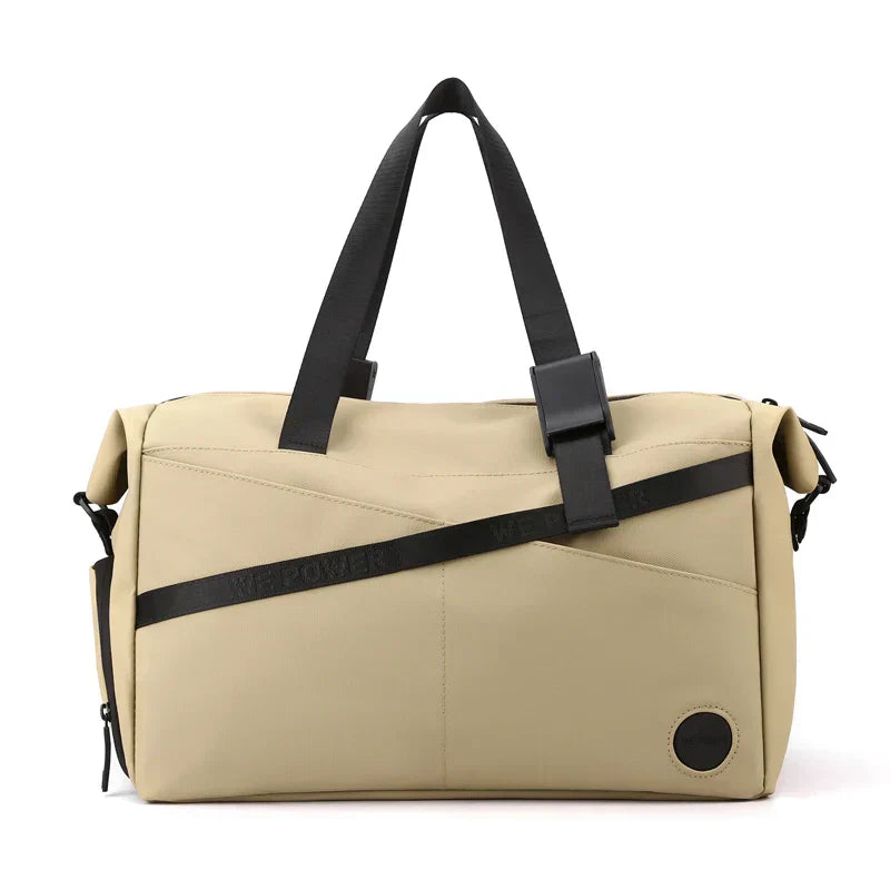 Borsa da viaggio beige con manici neri, design moderno e tasche multiple. Ideale per viaggi, palestra e uso quotidiano. Accessorio unisex elegante.