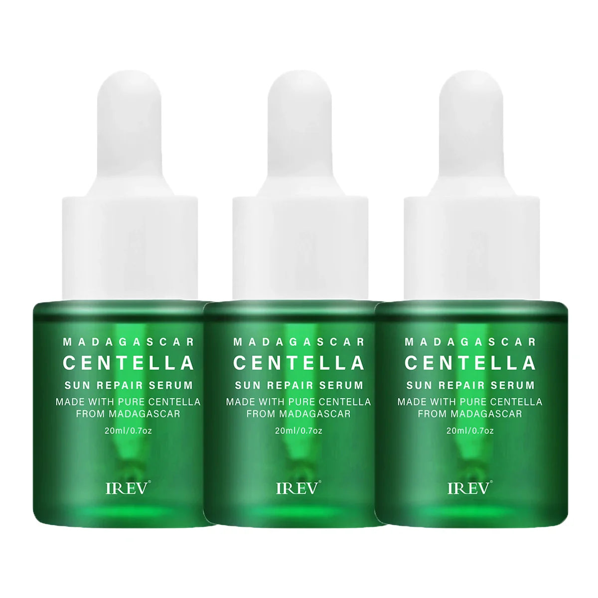Tre flaconi di siero riparatore solare Centella Madagascar da 20ml, con contagocce, etichetta verde, ideale per cura della pelle.