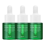 Tre flaconi di siero riparatore solare Centella Madagascar da 20ml, con contagocce, etichetta verde, ideale per cura della pelle.