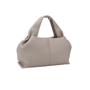 Borsa a mano in pelle beige, design elegante e minimalista, ideale per moda donna. Accessorio versatile per ogni occasione.