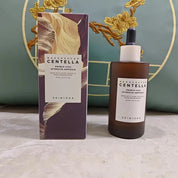 Ampolla SKIN1004 Centella Madagascar Probiocica, 50 ml, con confezione elegante. Siero viso idratante e lenitivo, ideale per pelle sensibile.