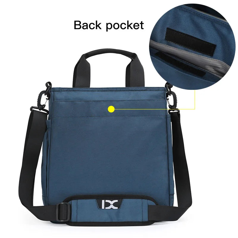 Borsa a tracolla blu con tasca posteriore, manici neri e tracolla regolabile. Design moderno, ideale per lavoro e viaggio.