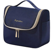 Borsa da toilette blu con cerniera, manico superiore e tasche laterali. Design compatto, ideale per viaggi e organizzazione accessori bagno.